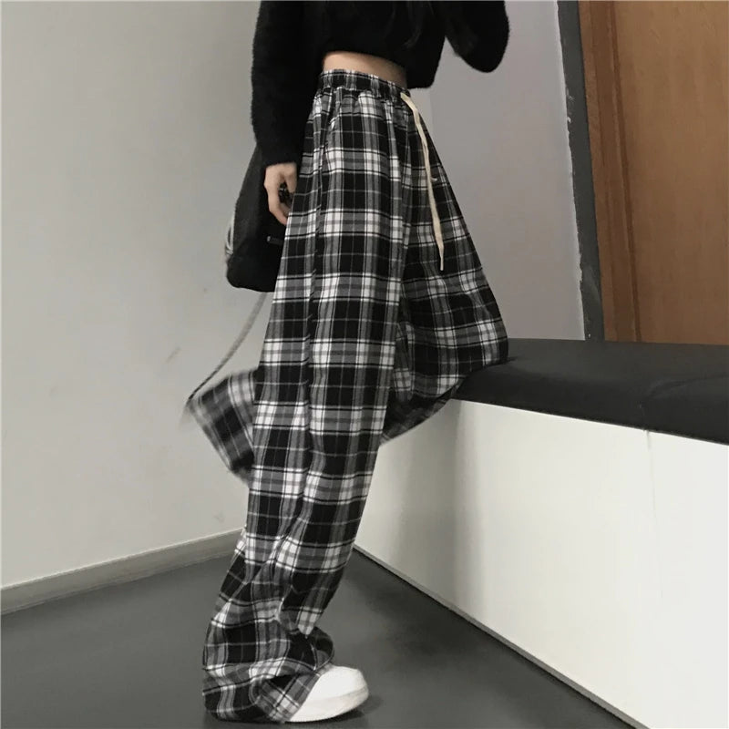Spodnie w kratę oversize — Alma
