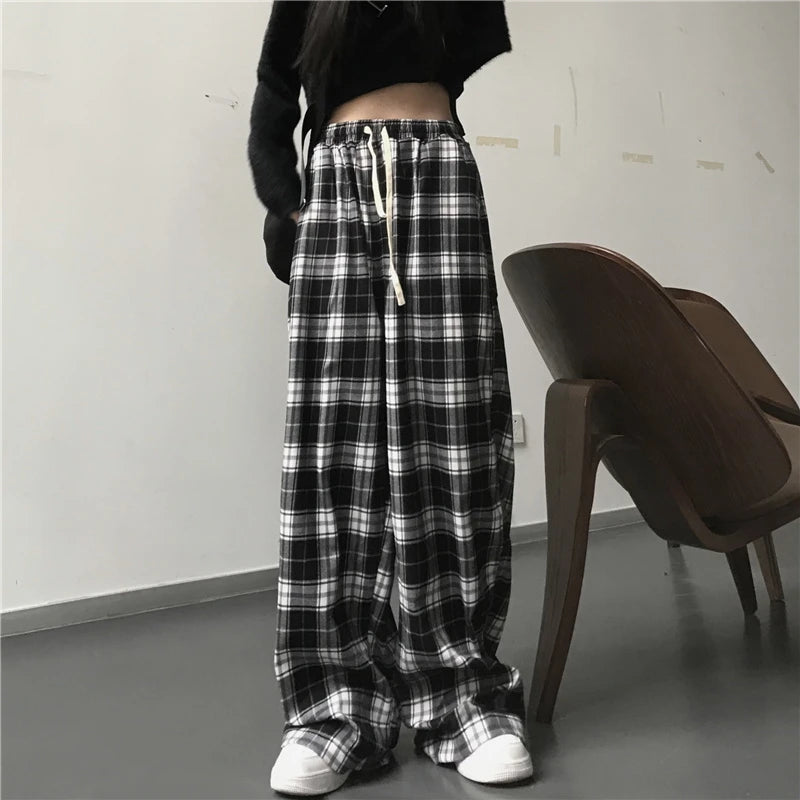Spodnie w kratę oversize — Alma