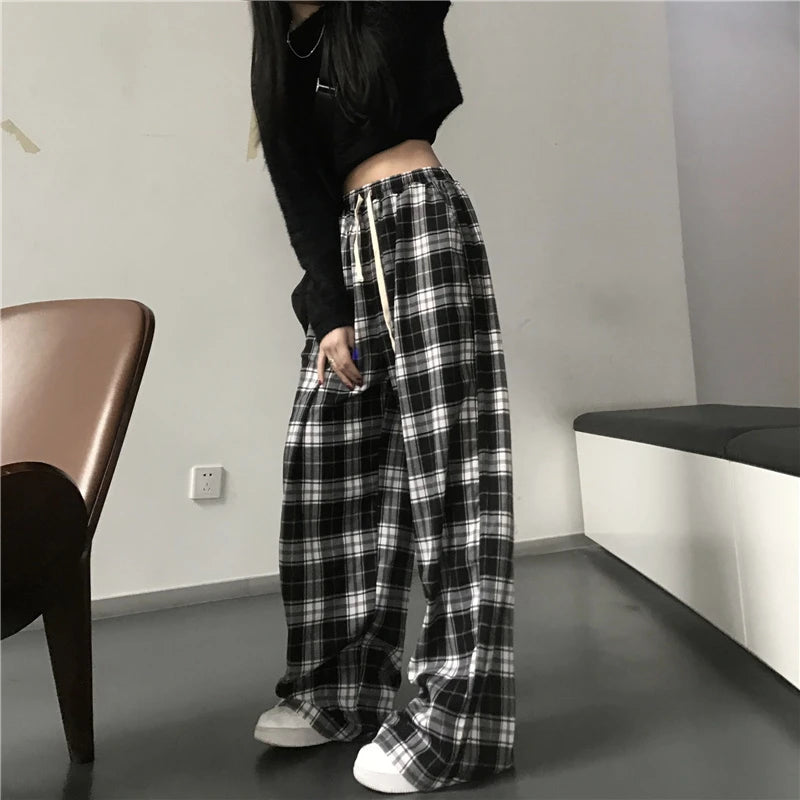 Spodnie w kratę oversize — Alma