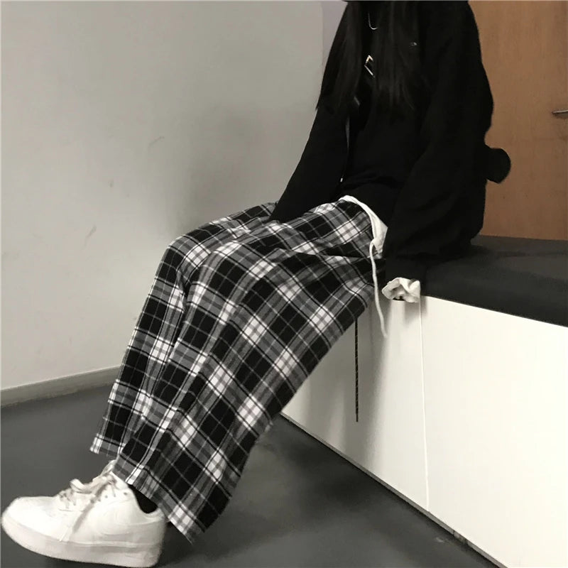 Spodnie w kratę oversize — Alma