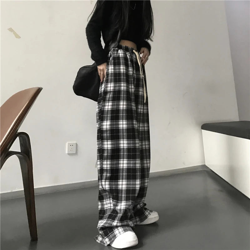 Spodnie w kratę oversize — Alma